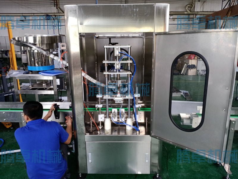 自動(dòng)灌裝旋蓋機(jī) 自動(dòng)灌裝旋蓋機(jī)
